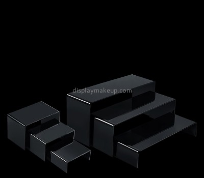 Custom black acrylic risers for display cosmetic items DMD-3015