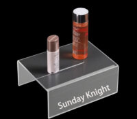 Custom acrylic U shaped skincare display riser