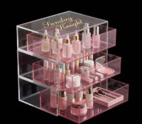 Custom acrylic skincare beauty drawers storage organizer box DMO-1395 Custom acrylic skincare beauty drawers storage organizer box featuring a clear and translucent pink design. Perfect for storing cosmetics, skincare bottles, and beauty accessories with multiple drawers for easy organization. Color, size, shape, and design can be customized. Wholesale only for bulk orders.